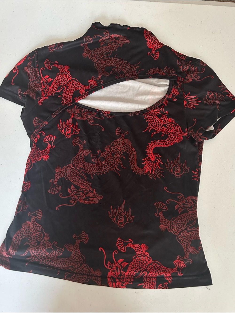 SHEIN Black Top with Red Dragon Cutout neck